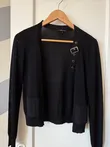 Nanette Lepore Black Buckle Cardigan (top_039) — worn open